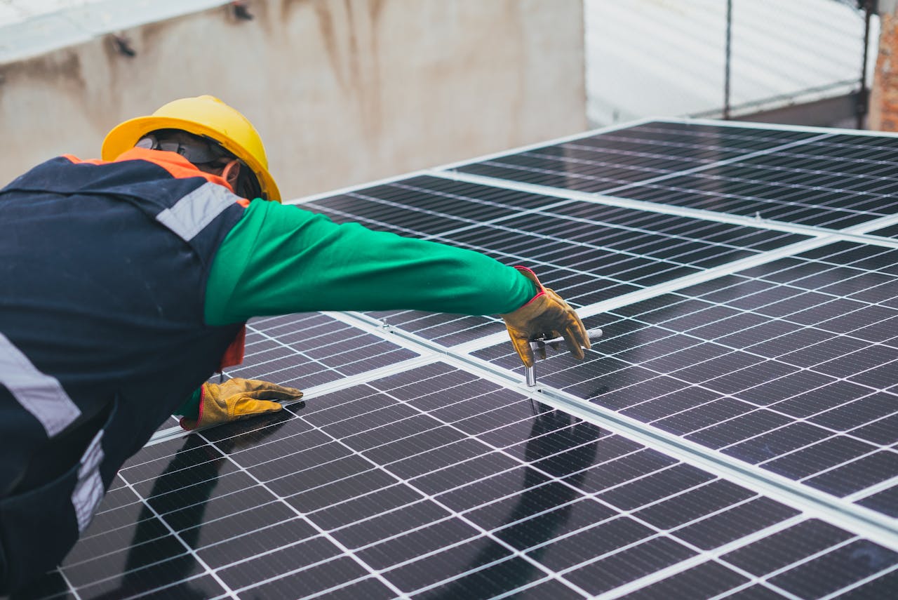 worker installing panels